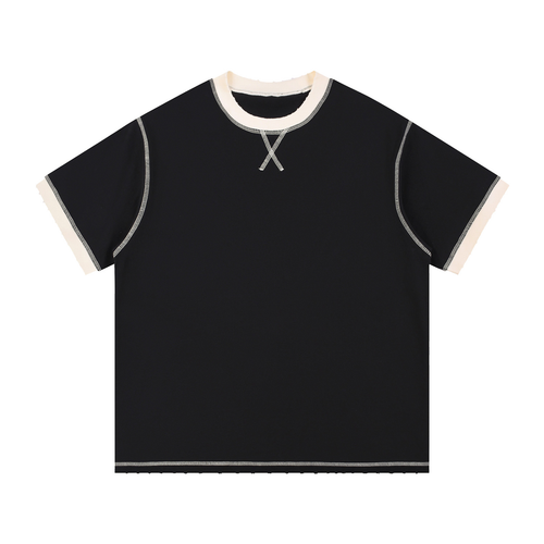 Model wearing Contrast-Stitched Cotton T-Shirt — drop-shoulder oversized cotton tee with sun-faded vintage wash. Australian streetwear by Vantage Heritage.