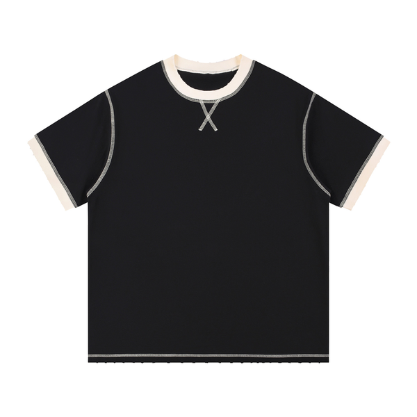 Model wearing Contrast-Stitched Cotton T-Shirt — drop-shoulder oversized cotton tee with sun-faded vintage wash. Australian streetwear by Vantage Heritage. 1